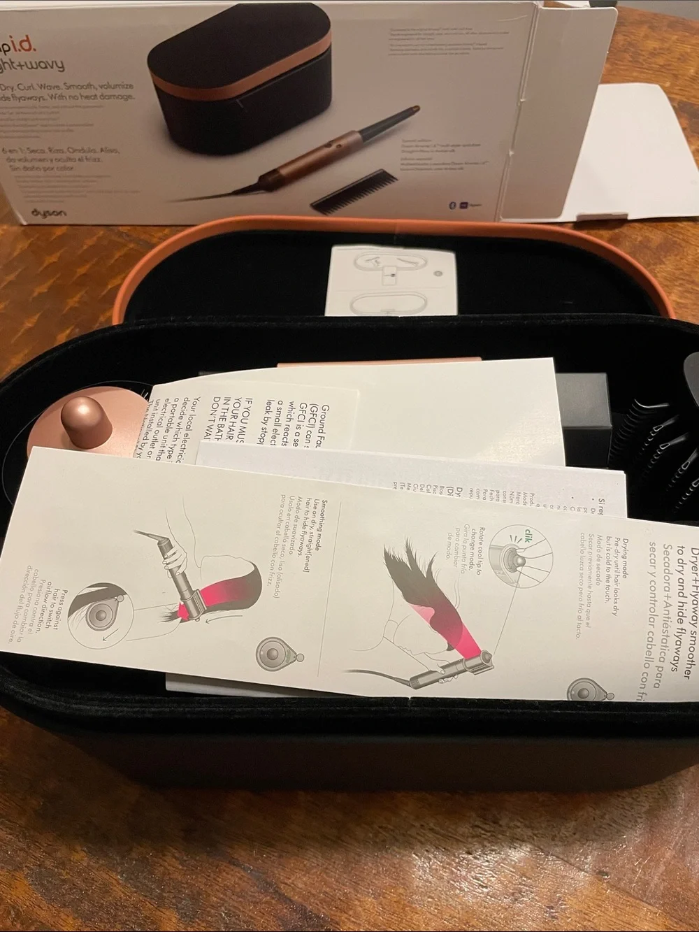 Dyson Airwrap i.d. Straight+wavy. Color copper and black.